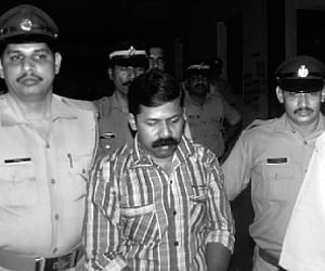 Puthenvelikkara murder case accused Jayanandan being brought out of the Ernakulam CBI Special Court on Wednesday | Express