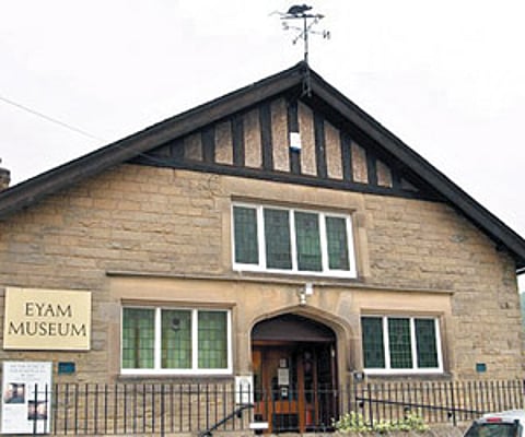 Eyam Museum with the ‘plague’ rat on the weather vane. The Eyam village museum is a popular and major tourist attraction for visitors to Derbyshire