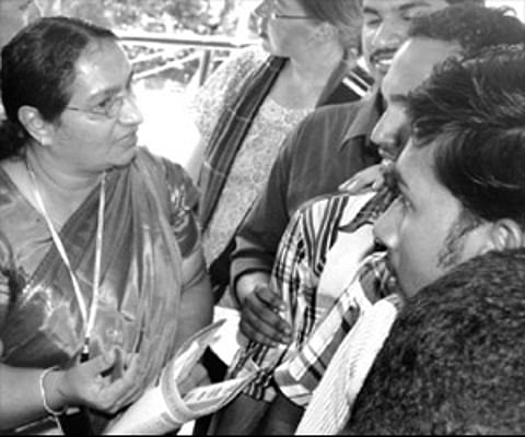 Sister Jesme, who was waiting for receiving her delegate pass at the Kalabhavan theatre on Friday, engaged in a conversation | EPS