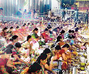 Hundreds of women participate in the pooja as part of Hanuman Jayanthi celebrations at Ragigudda Temple on Tuesday I NAGARAJA GADEKAL