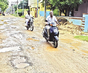 The dilapidated condition of Ramapuram Main Road.