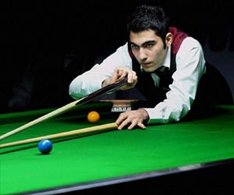ran s Hossein Vafaei Ayouri plays a shot during the final match against Wales Lee Walker. (PTI)