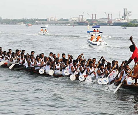 A snakeboat being rowed in the backwaters of Kochi, in connection with the launch of the high-speed patrol boats for the city police on Friday.