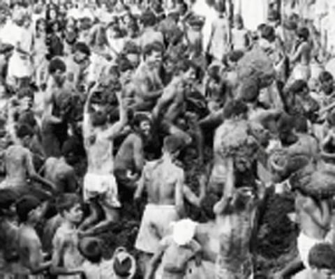 Villagers playing with cow dung balls at Gumatapura on Karnataka-Tamil Nadu border|Ra Mahadev