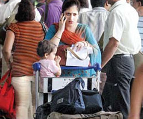 Stranded passengers at Delhi airport on Wednesday.