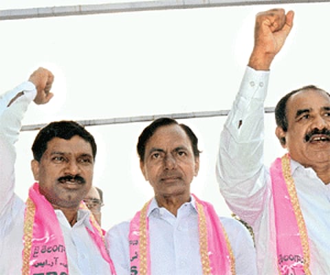 Congress MLAs (from left) T Rajaiah, S Satyanarayana (associate) and Jupalli Krishna Rao with K Chandrasekhar Rao (second from left) in Hyderabad.