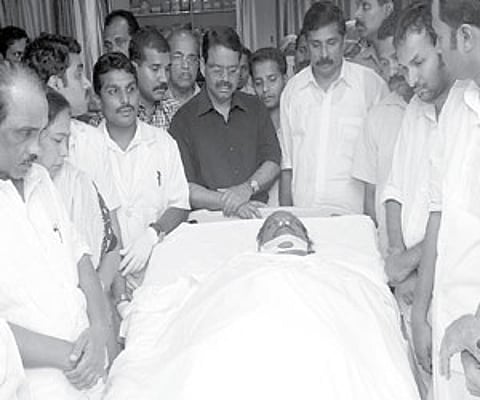 The body of T M Jacob being kept at Lakeshore Hospital, Kochi, on Sunday. Ministers K Babu, K M Mani, Mayor Tony Chammany and Congress MLA P C Vishnun