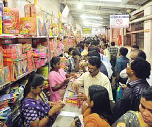 Fireworks shops in the city witnessed a big rush on Thursday for last-minute purchase. A scene from a shop at Chalai. ENS