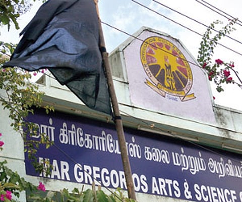 A black flag hoisted at their college on Sunday.