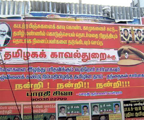 A poster in Coimbatore glorifying the encounter killing of Mohanraj, (EPS)