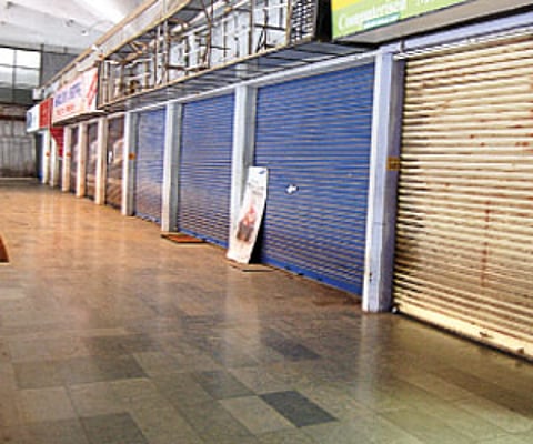 An array of shops with closed shutters at the GCDA shopping complex at Marine Drive | Express Photo