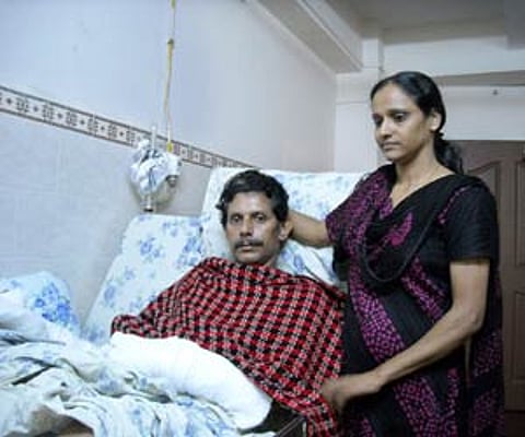 Prof TJ Joseph and wife Salomi while in hospital. ENS File Photo