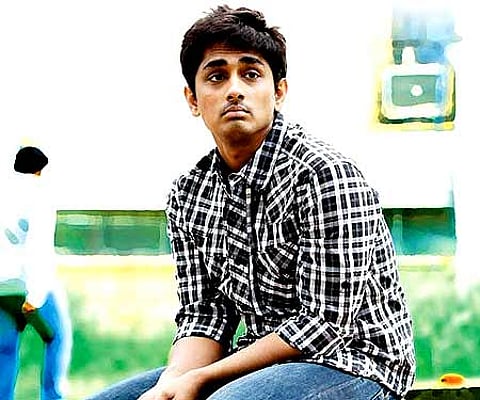 The poster of 'Kadhalil Sodhappuvadhu Yeppadi'.