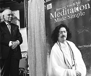 Governor H R Bhardwaj releasing ‘Between You & Me Meditation Made Simple’, a book by Shri Nimishananda at Bharatiya Vidya Bhavan on Wednesday. (EPS)