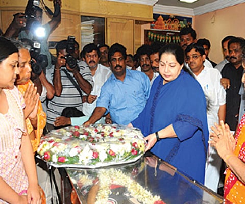 CURTAIN COMES DOWN: AIADMK general secretary J Jayalalithaa placing a wreath on the body of S S Chandran who died of cardiac arrest on Saturday.