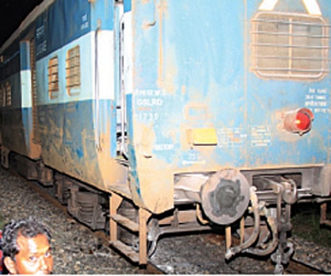 The last bogie of Tirunelveli-bound Nellai Express that got derailed near Lalgudi in the early hours of Sunday.