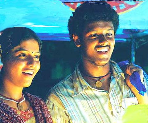 The poster of 'Angadi Theru'.