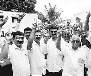 Triumphant BJP candidate Dr YC Vishwanath with BJP MLAs DS Suresh, DN Jeevaraj in Kadur on Thursday.