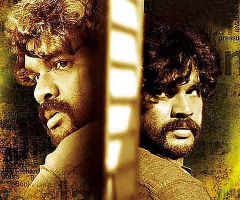 The poster of 'Pulivesham'.