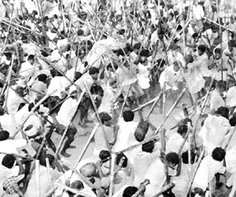 Villages in Devaragutta fight with sticks during Dasara festival in Kurnool district. (EPS)