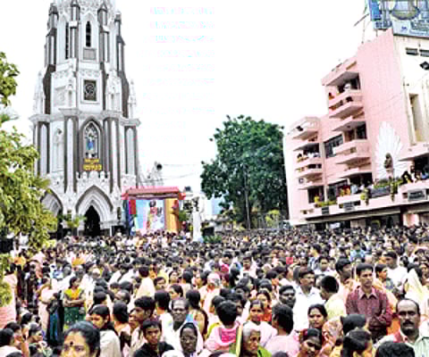 Devotees gather in large numbers on the inaugural day of St Mary’s Feast at St Mary’s Basilica at Shivajinagar on Monday | Nagesh Polali
