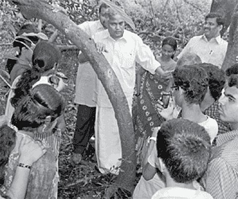Forests Minister Benoy Viswam interacting with students in the Mangalavanam as a part of the Wildlife Week celebrations in Kochi on Sunday. EPS