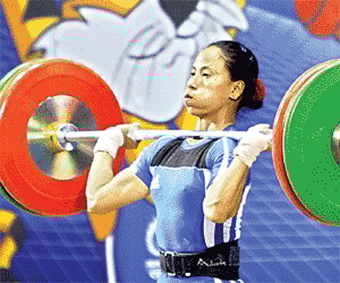 Heavy Mettle: Indian lifter Ngangbam Soniya Chanu en route to winning a silver medal in the women’s 48-kg event in New Delhi on Monday | Jipson Sikher