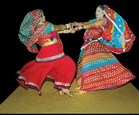Ram Parsad Sharma aka Albeli (right) performing a traditional Rajasthani dance, jhumer, at the Pappali Hall on Wednesday.