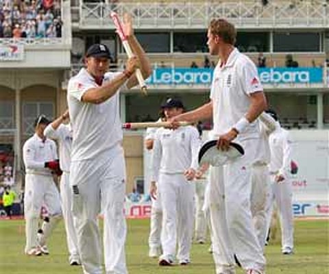 Tim Bresnan and Stuart Broad walk from the pitch with teammates after their win over India on the fourth day of the second Test. AP