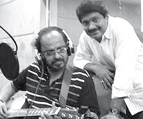 G Venugopal with music maestro Johnson Master