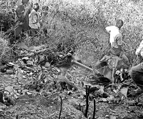 Locals taking a closer look at the wreckage of the unmanned aerial vehicle at Himachal Nagar in Gajuwaka area in Visakhapatnam on Thursday.