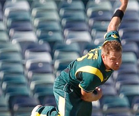 Ryan Harris of Australia gets some physiotherapy on his shoulder during training at the MCG in Melbourne on Friday, Dec. 23, 2011. (AP)