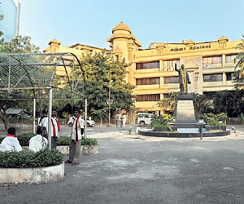 PARKING LOT TURNS PARK: The parking lot for visitors in the Anna Arivalayam premises was converted into a makeshift park (circled) after objection was