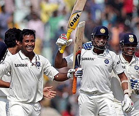 Pragyan Ojha held on with Laxman, who had Raina as a runner, to see India through. (Photo: AP)