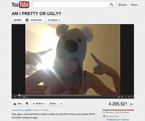 This image from video posted on YouTube shows a girl asking "Am I pretty or ugly?" (AP Photo)