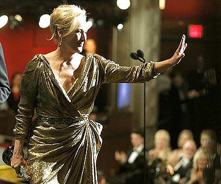 Meryl Streep gestures as she accepts the Oscar for best actress for 'The Iron Lady' (AP Photo/Chris Carlson).