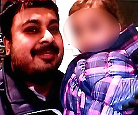 A screen grab of Anurup Bhattacharya with his kid.