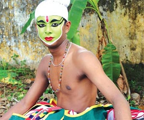 Akash Rafeek waiting for his turn to perform ‘ottam thullal’ at the revenue district school arts festival | Express