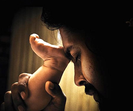 The poster of 'Vinmeengal'.