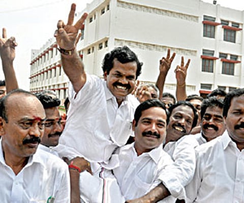 VICTORY LAP: AIADMK MP P Kumar and functionaries accompany jubilant cadre as they celebrate the victory of M Paranjothi, in Tiruchy | Express photo