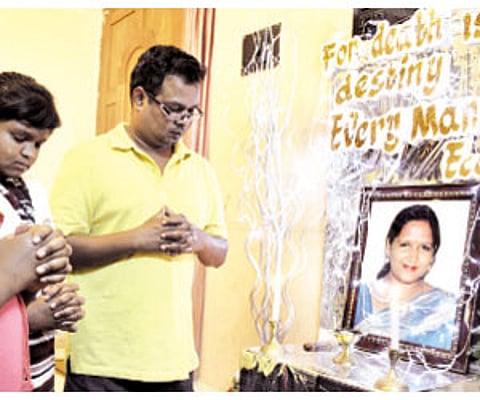Above: Shantakumar, who lost his wife Benzie in the Carlton Towers fire tragedy, with his two daughters and (Left) a view of the Carlton To