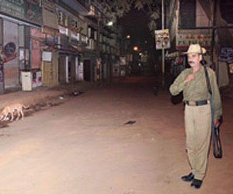 A police man stationed at the spot of crime at Goraguntepalya on Saturday night