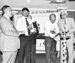 Dr Murugesh Mudaliar, Vijay Anand and others inaugurating the event | Express photo