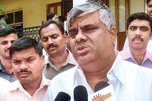 JD(S) leader H D Revanna speaking to reporters on Monday