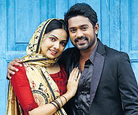 Defence Minister A K Antony with Finance Minister K M Mani at the state-wide inauguration of Karunya Benevolent Fund at VJT Hall in Thiruvananthapuram