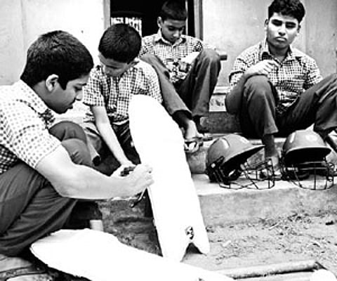 A young girl undergoes tense moments as she gets tattooed