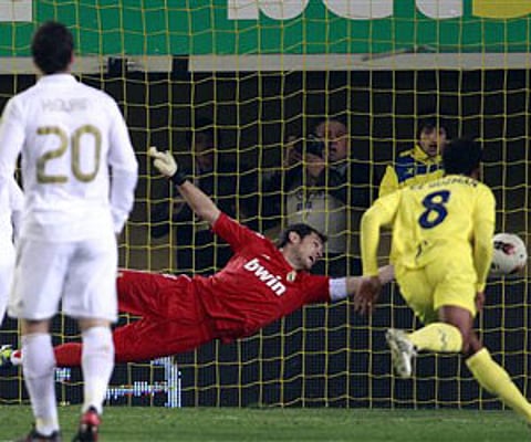 Real Madrid's goalkeeper Iker Casillas, center, is unable save a goal against Villarreal (AP)