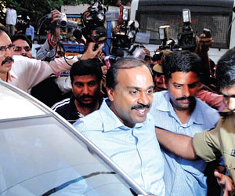 in a minefield: Former Karnataka minister Gali Janardhan Friday Reddy (left) at the Chanchalguda jail in Hyderabad on Monday