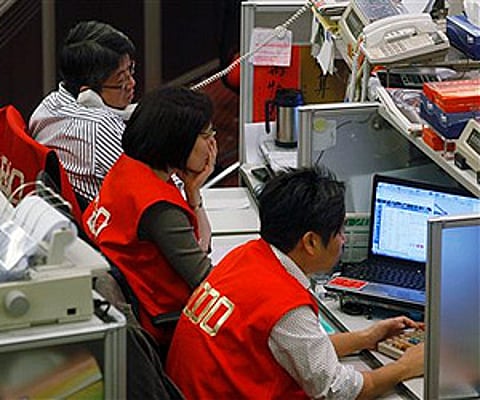 Asian markets showed a mixed trend on Friday.