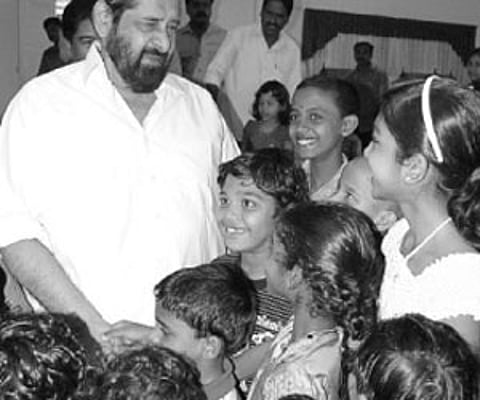 Actor Madhu interacting with children at the vacation class organised by Kerala State Council for Child Welfare | Express